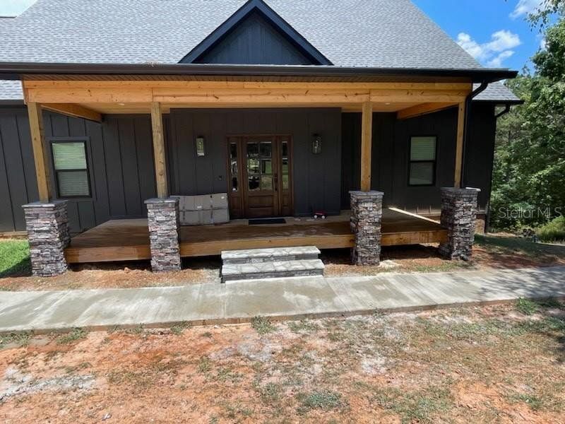 Exterior details and patio area of a home in , Blairsville (Image 4).