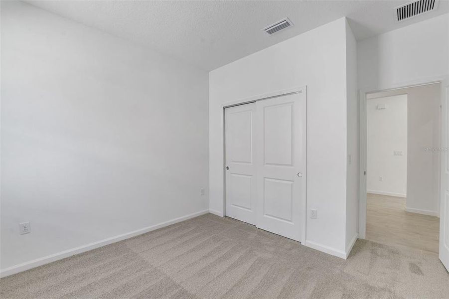 Spacious, unfurnished interior of a new home in Willowbrook North, Winter Haven (Image 23).