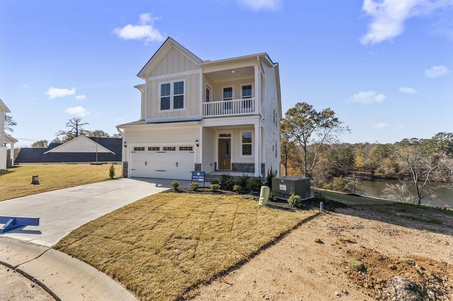 Front exterior of a new home in Lakeside Saluda, Greenville, SC, highlighting curb appeal (Image 2).