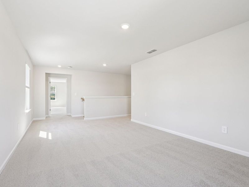 Spacious, unfurnished interior of a new home in Moss Farms, Lula (Image 18).