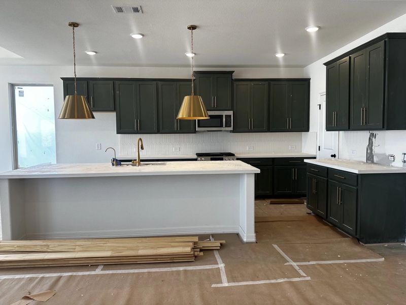 In-progress construction of a new home in Sunterra, Katy, TX (Image 27).