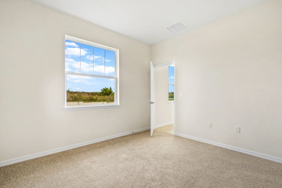 Representative unfurnished interior of a home built from the Beverly by Holiday Builders in Eden Hills, Lake Alfred (Image 14).