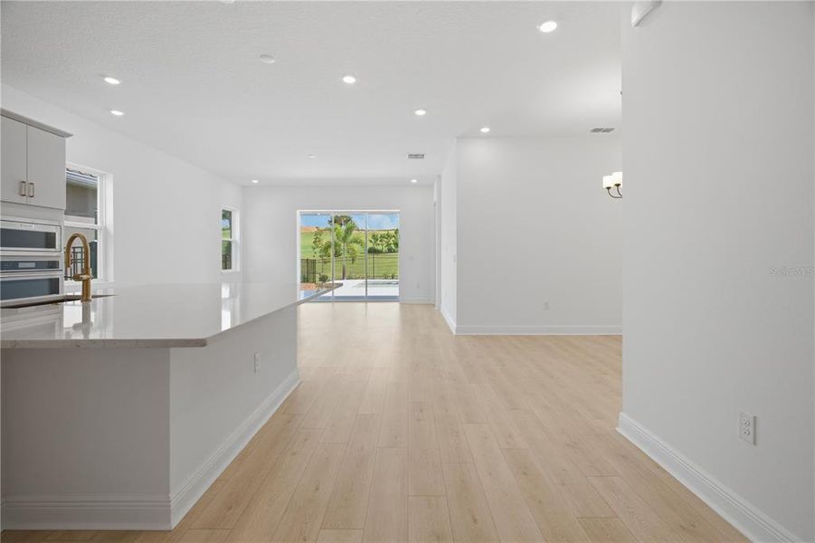 Spacious, unfurnished interior of a new home in Bella Collina, Montverde (Image 39).