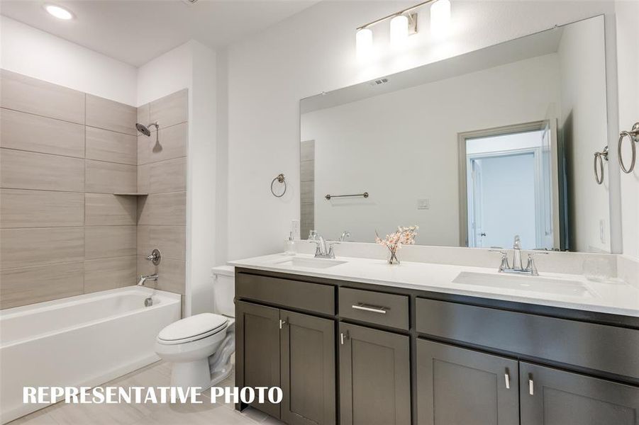 Guests will enjoy their own space in this peaceful and relaxing guest bath.  REPRESENTATIVE PHOTO.