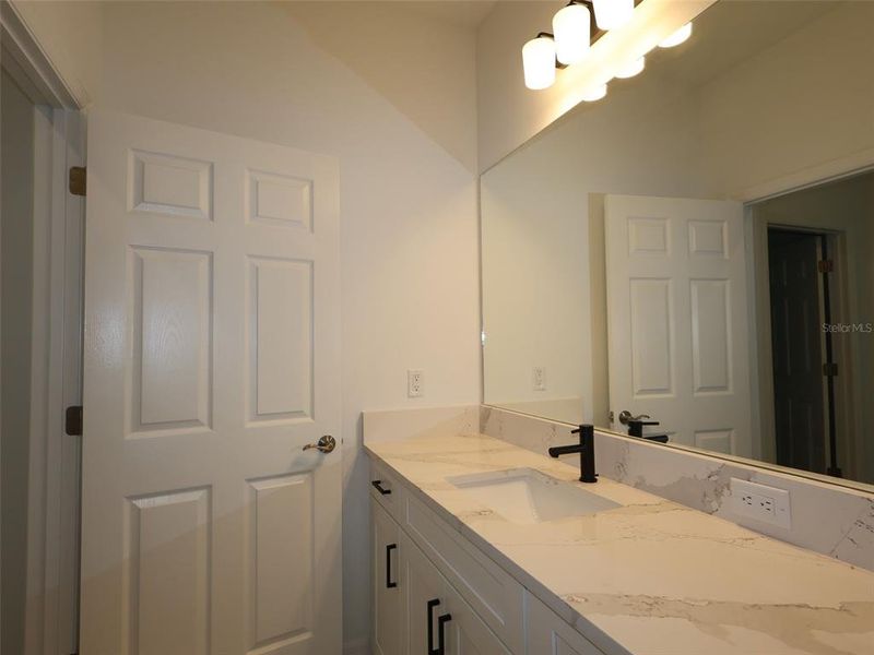 Furnished interior view inside a new home in Sweetwater at Lakewood Ranch, Lakewood Ranch (Image 9).