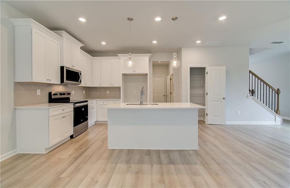 Furnished interior view inside a new home in Enclave at Evergreen, Fairburn (Image 7).