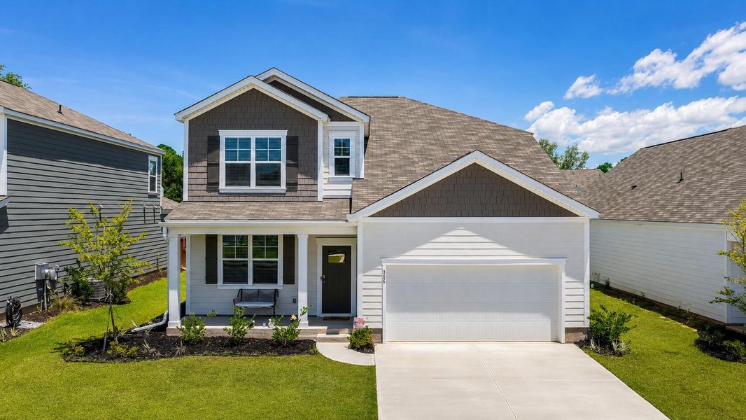 Front exterior of a new home in Lakeview at Kitfield, Moncks Corner, SC, highlighting curb appeal (Image 1). Front exterior of a new home in Lakeview at Kitfield, Moncks Corner, SC, highlighting curb appeal (Image 1).