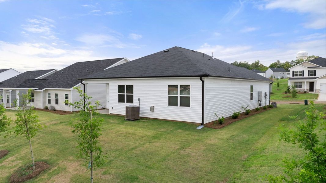 Exterior details and patio area of a home in Highland Hills, Graniteville (Image 3).