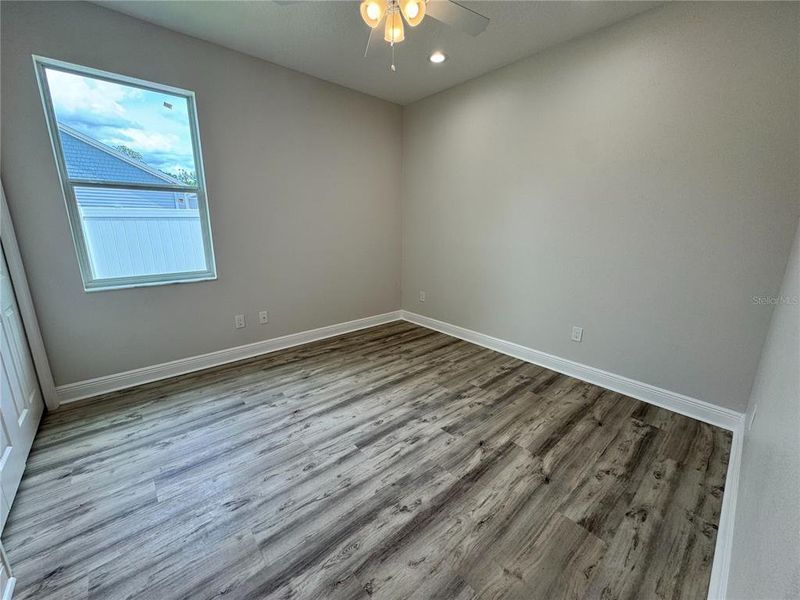 Spacious, unfurnished interior of a new home in , Dade City (Image 40).
