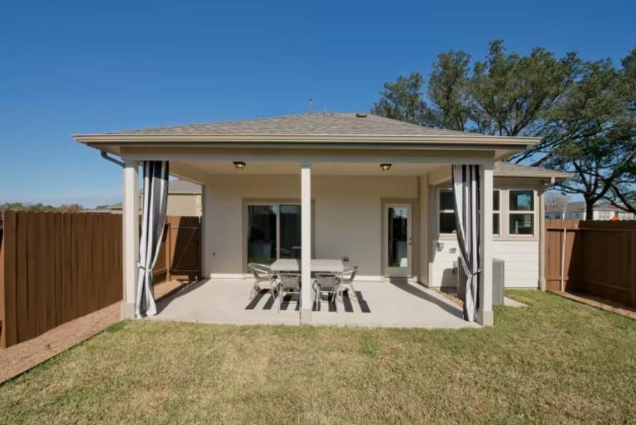 Photo of Pulte model home with same floor plan, not of actual home listed.