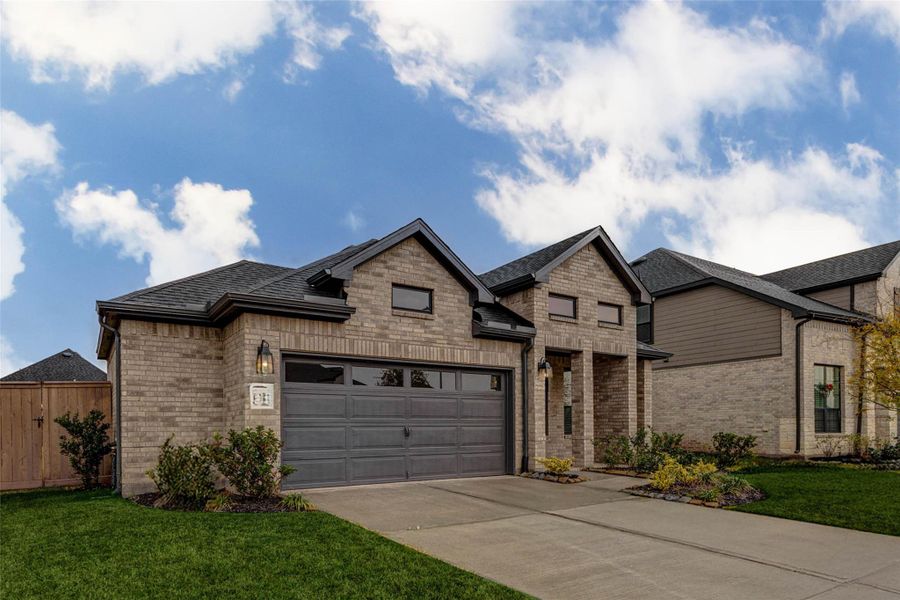 Front exterior of a new home in Katy Court, Katy, TX, highlighting curb appeal (Image 2).