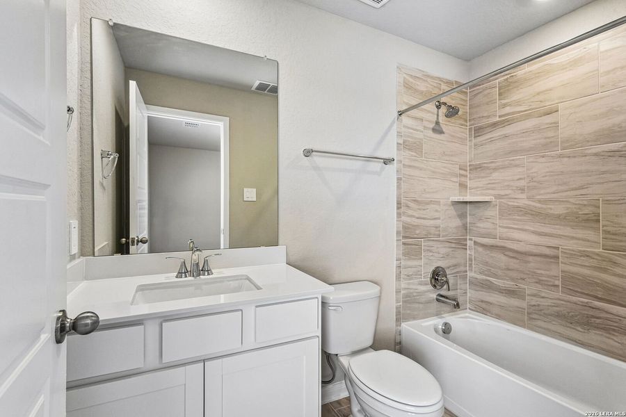 Furnished interior view inside a new home in Royal Crest, San Antonio (Image 12).