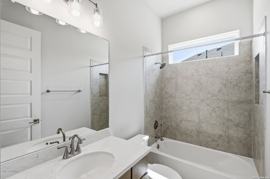 Furnished interior view inside a new home in Potranco Oaks, Castroville (Image 13).