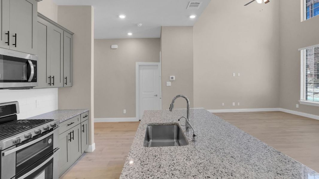 Furnished interior view inside a new home in The Avenue, Allen (Image 8).