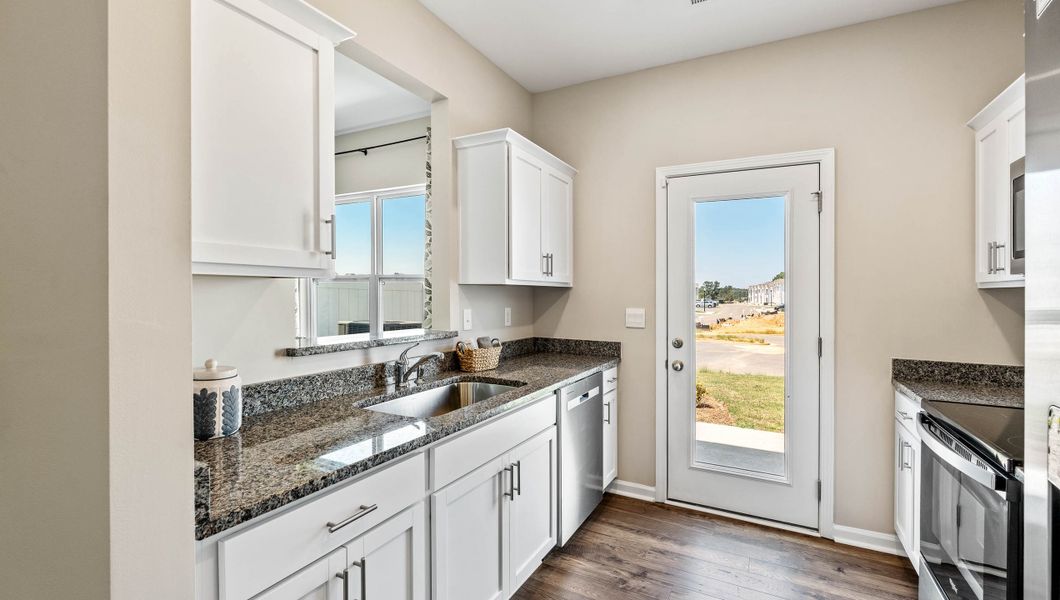 Furnished interior view inside a new home in Tanglewood Townes, Greenville (Image 10).