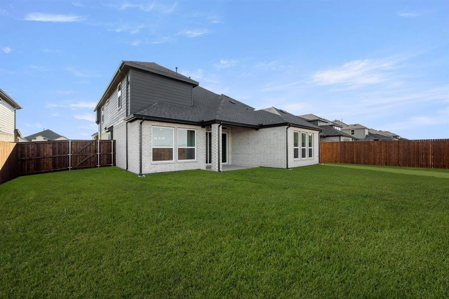 Exterior details and patio area of a home in Westside Preserve, Midlothian (Image 4).