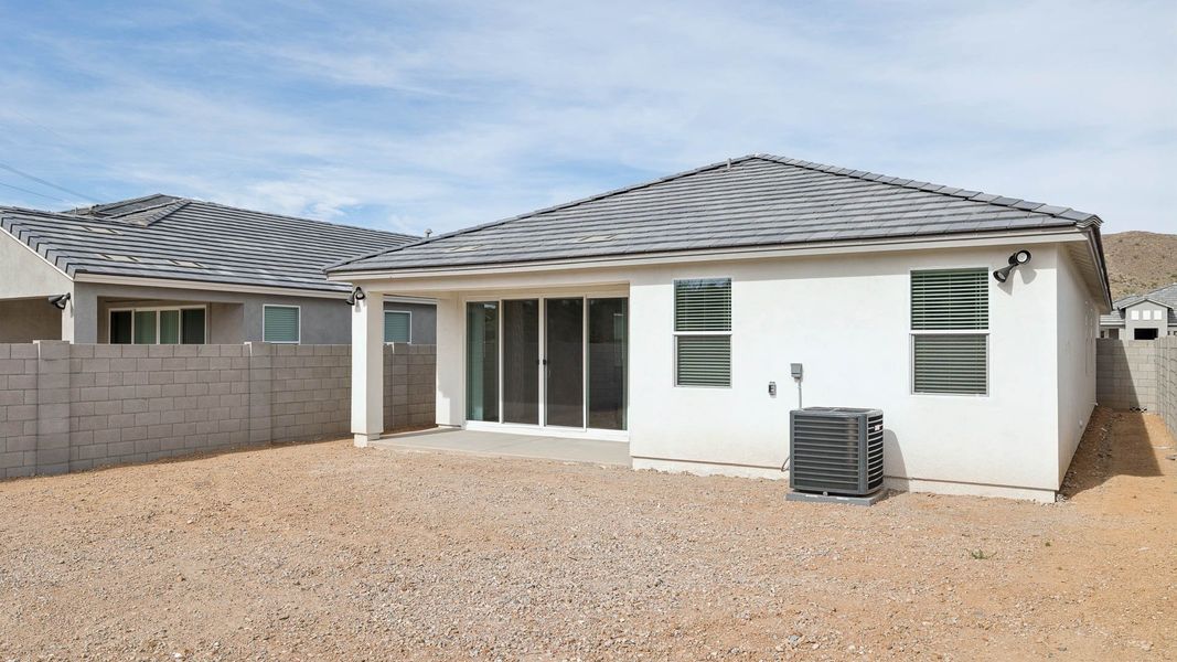 Exterior details and patio area of a home in The Ridge at Stone Butte, Phoenix (Image 3).