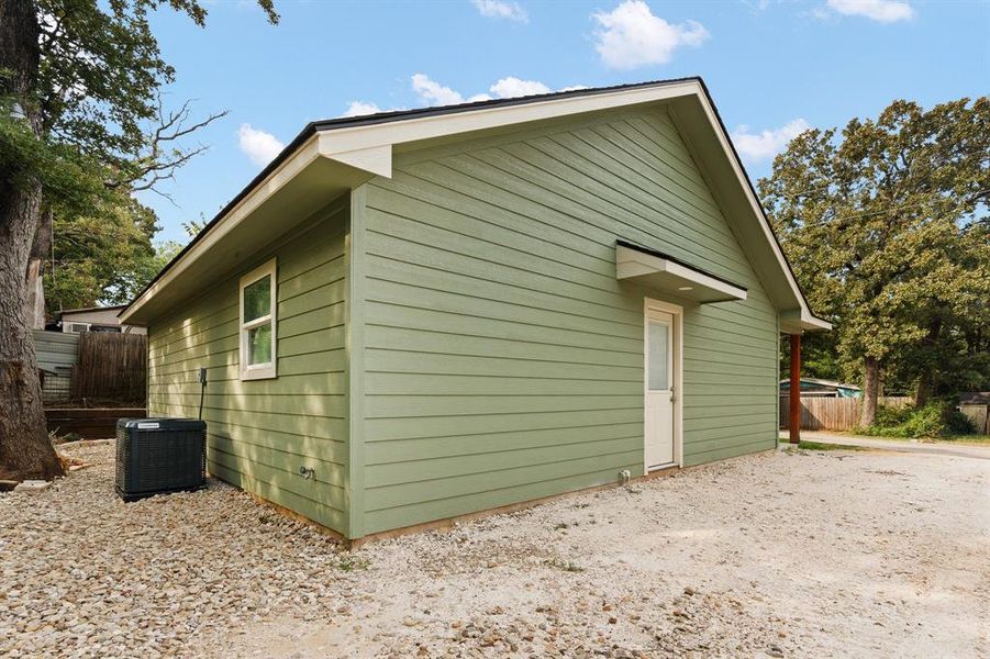 Front exterior of a new home in , Alvarado, TX, highlighting curb appeal (Image 15).