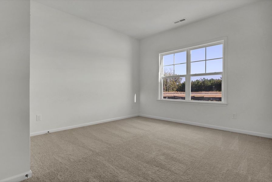 Spacious, unfurnished interior of a new home in Grand Park, Leland (Image 22).