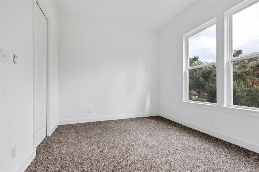 Secondary bedroom located on the third floor. (Model Unit 9424C)