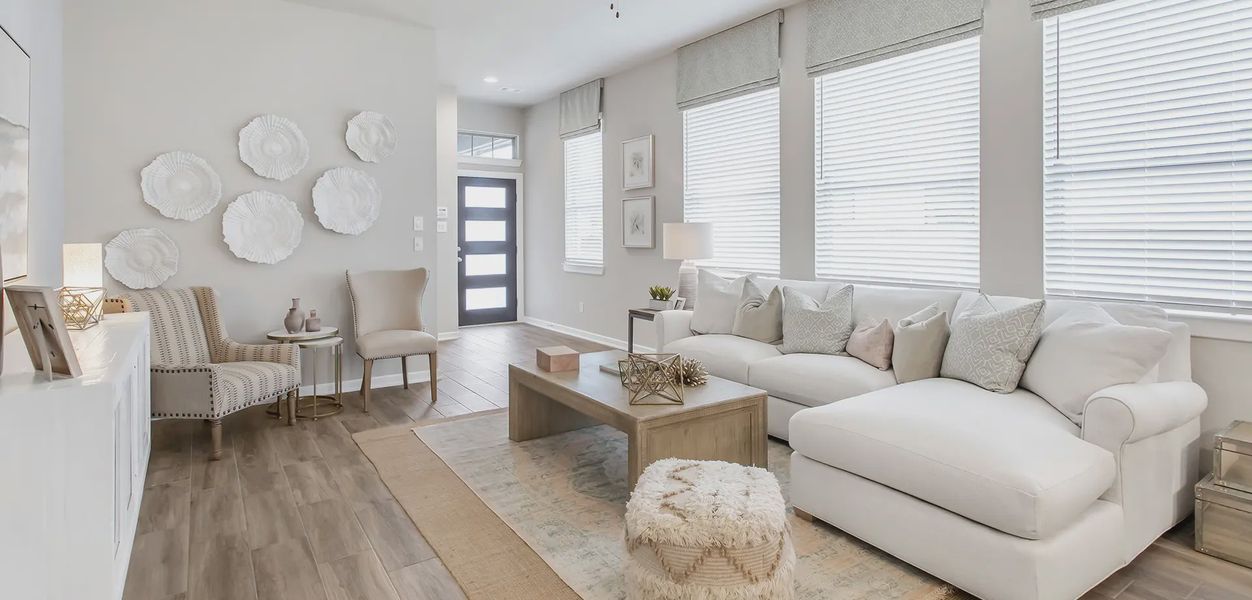 Representative furnished interior of a home built from the Ann Arbor by Chesmar Homes in Sunterra, Katy (Image 4). Representative furnished interior of a home built from the Ann Arbor by Chesmar Homes in Sunterra, Katy (Image 4).
