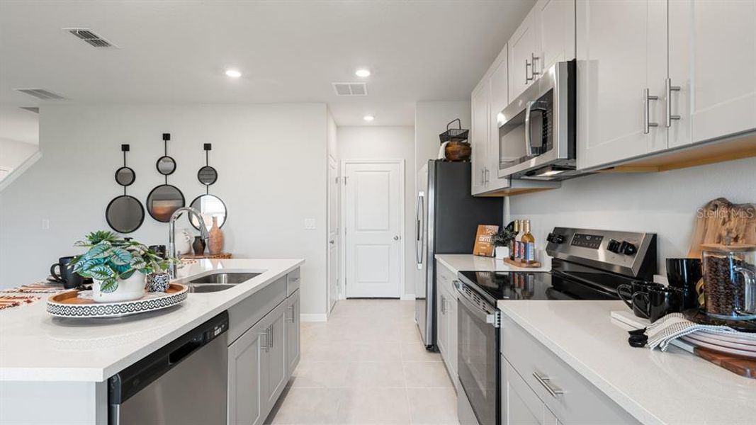 Furnished interior view inside a new home in Coasterra Community Group Page, Palmetto (Image 14).