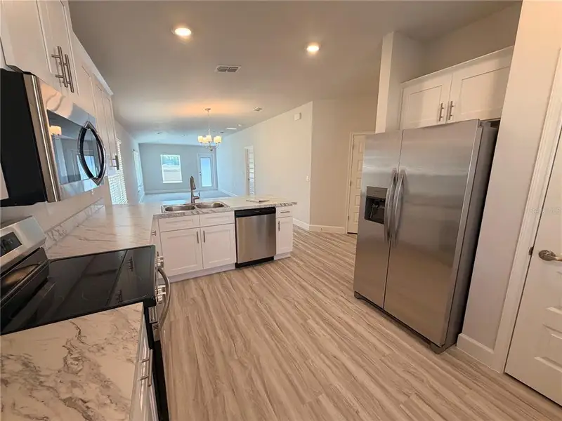 Furnished interior view inside a new home in Rolling Hills, Bell (Image 10). Furnished interior view inside a new home in Rolling Hills, Bell (Image 10).