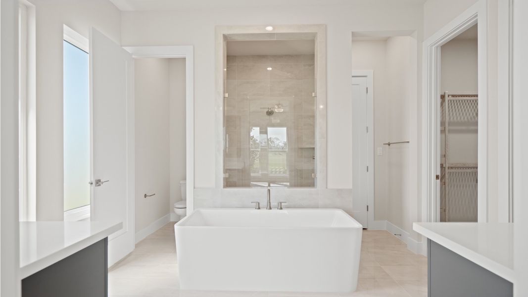 Furnished interior view inside a new home in Glynlea Country Club, Port St. Lucie (Image 6).