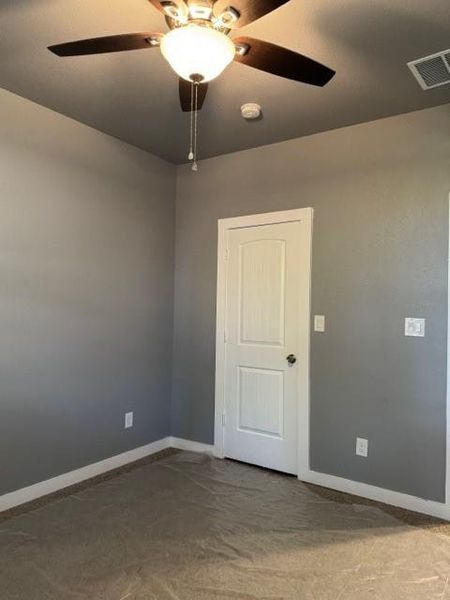 Empty room with ceiling fan