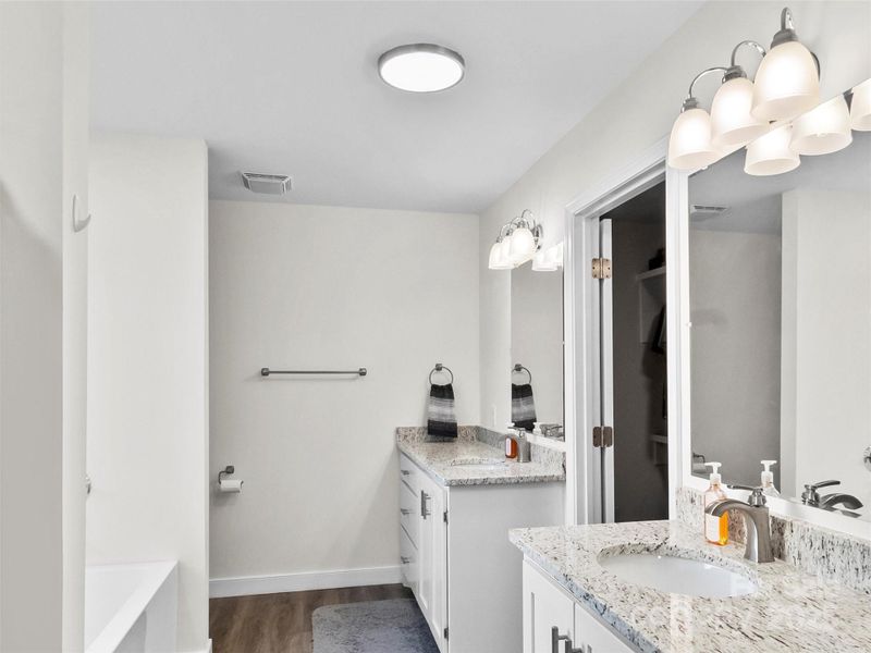 Primary Ensuite Bathroom with Separate Tub & Shower Stall