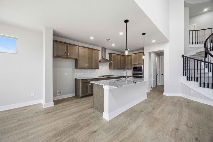 Furnished interior view inside a new home in Sunterra 50s, Katy (Image 9).