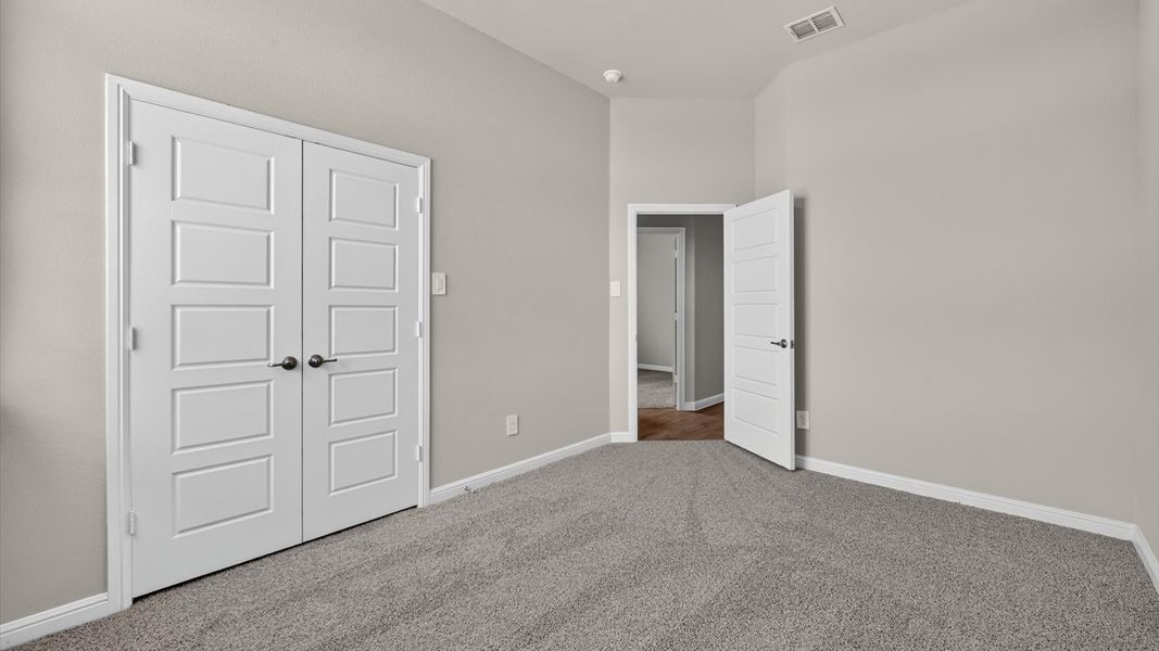 Representative unfurnished interior of a home built from the Bartlett by D.R. Horton in Lakeview Pointe, Midlothian (Image 24).