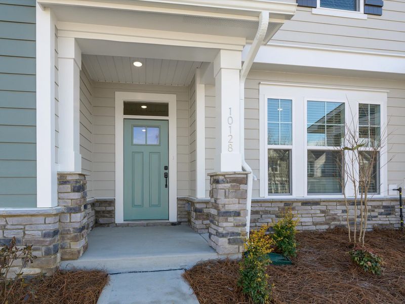 Exterior details and patio area of a home in North Creek Village - Townhomes, Huntersville (Image 23).
