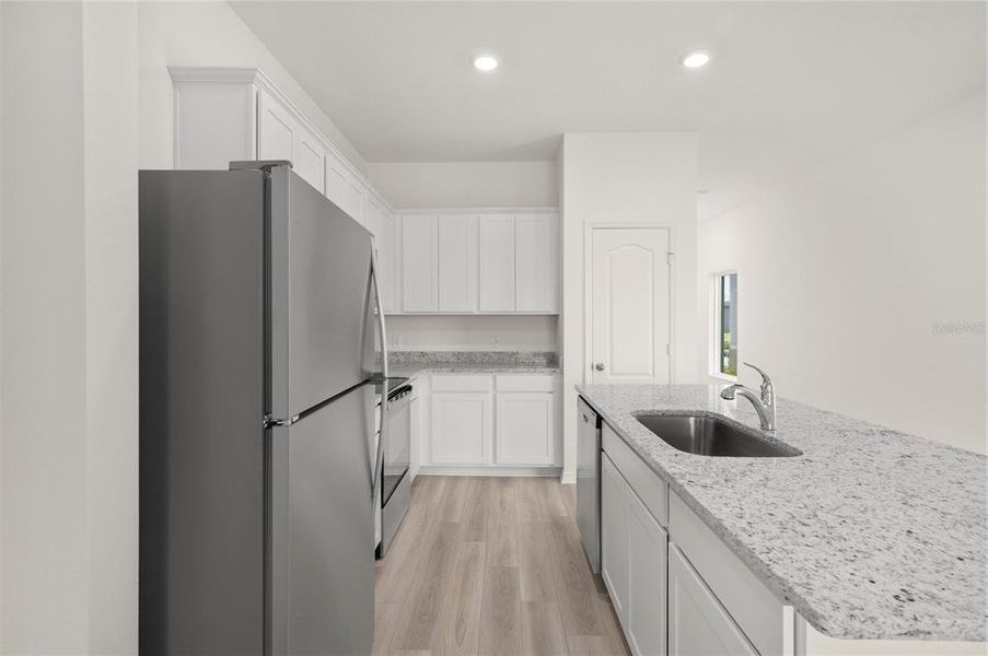 Furnished interior view inside a new home in Gum Lake Preserve, Lake Alfred (Image 8).
