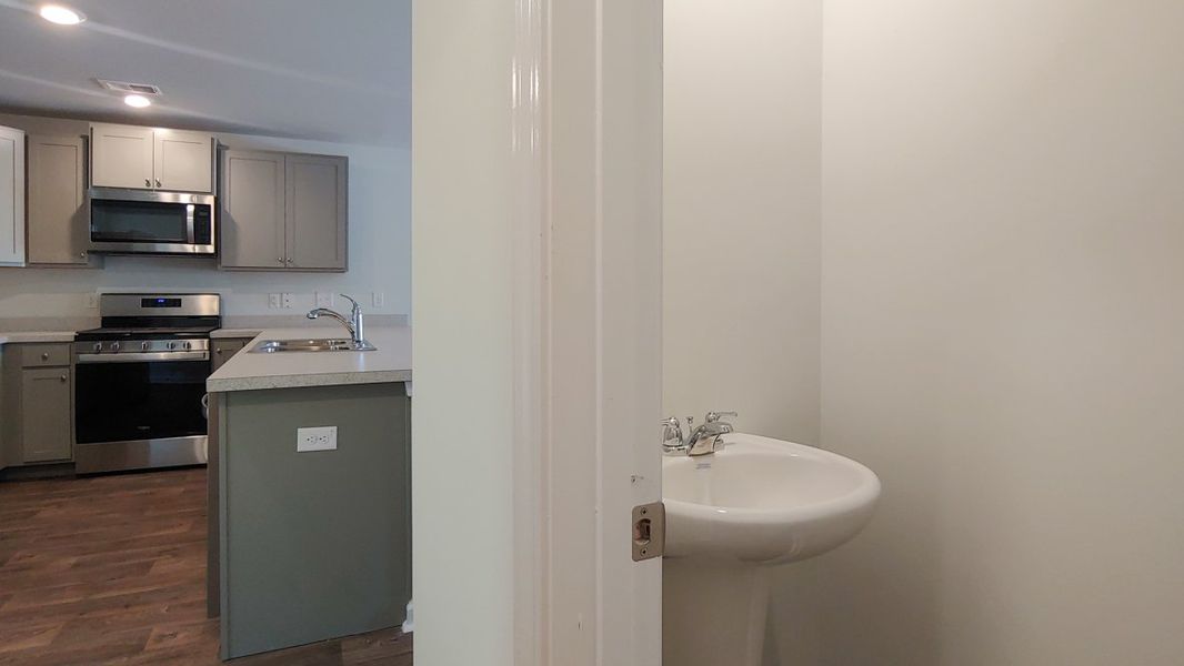 Representative furnished interior of a home built from the RICHBURG by D.R. Horton in Garbon Fields, Summerville (Image 9).