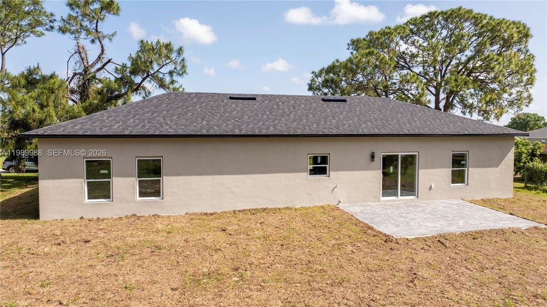 Exterior details and patio area of a home in , Sebring (Image 3).