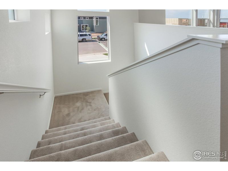 Spacious, unfurnished interior of a new home in Trailside Story Collection - Single Family Homes, Timnath (Image 32).