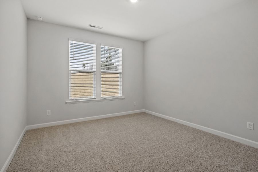 Spacious, unfurnished interior of a new home in Ovation at Sweetbrier, Durham (Image 25).