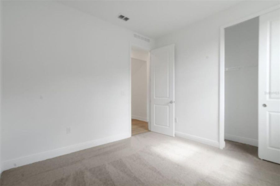 Spacious, unfurnished interior of a new home in Reserve at Hammock Oaks, Lady Lake (Image 28). Spacious, unfurnished interior of a new home in Reserve at Hammock Oaks, Lady Lake (Image 28).