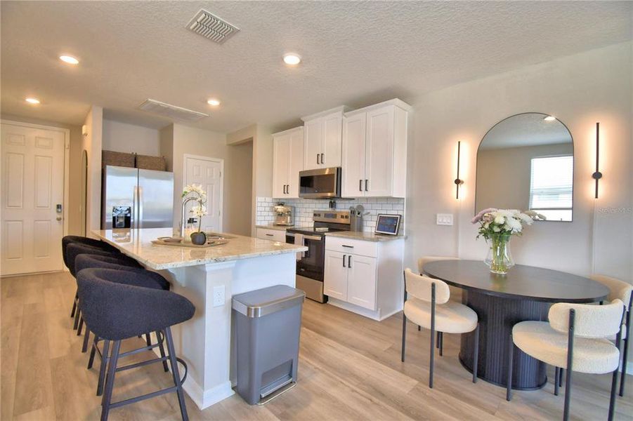Furnished interior view inside a new home in Lake Deer Estates - Classic Series, Kissimmee (Image 10).