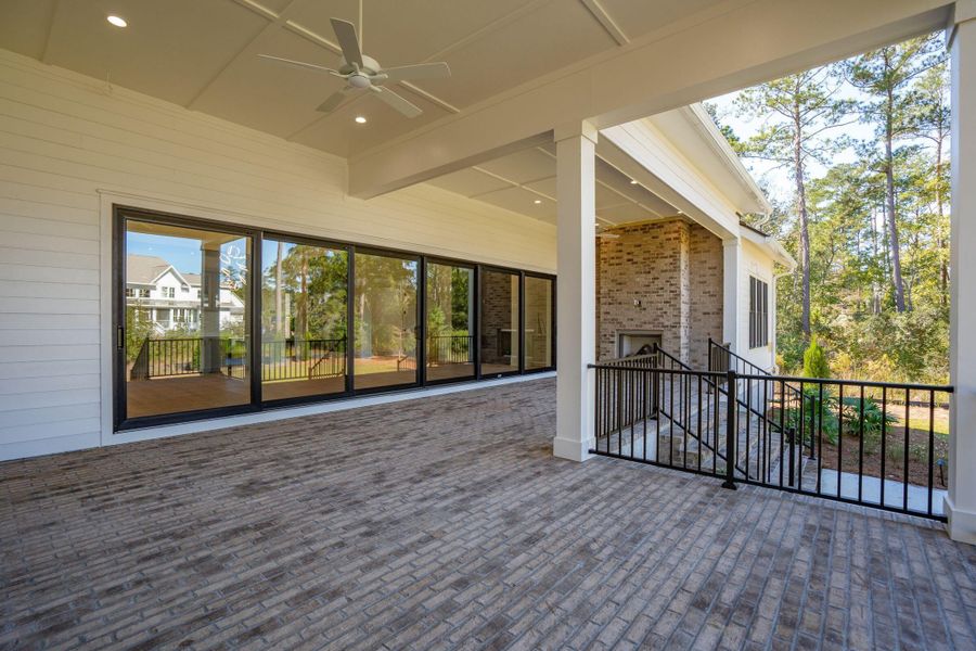 Exterior details and patio area of a home in , Ravenel (Image 31).