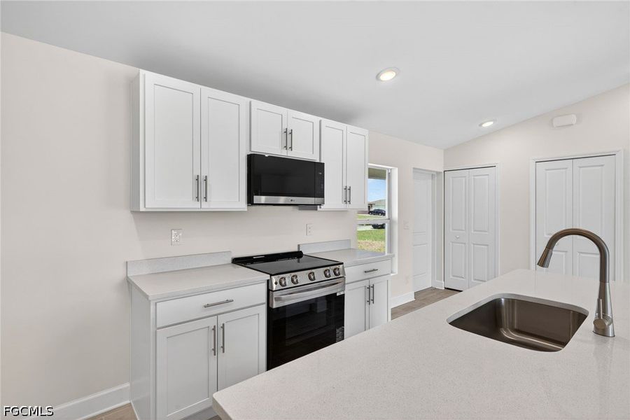 Furnished interior view inside a new home in Cape Coral, Cape Coral (Image 6). Furnished interior view inside a new home in Cape Coral, Cape Coral (Image 6).