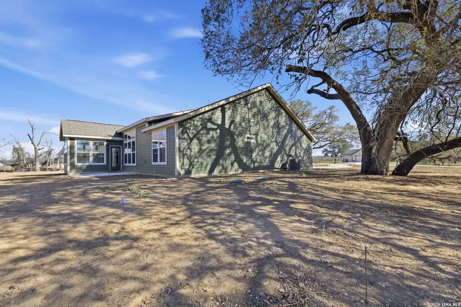 Exterior details and patio area of a home in Lonesome Dove, San Antonio (Image 3).
