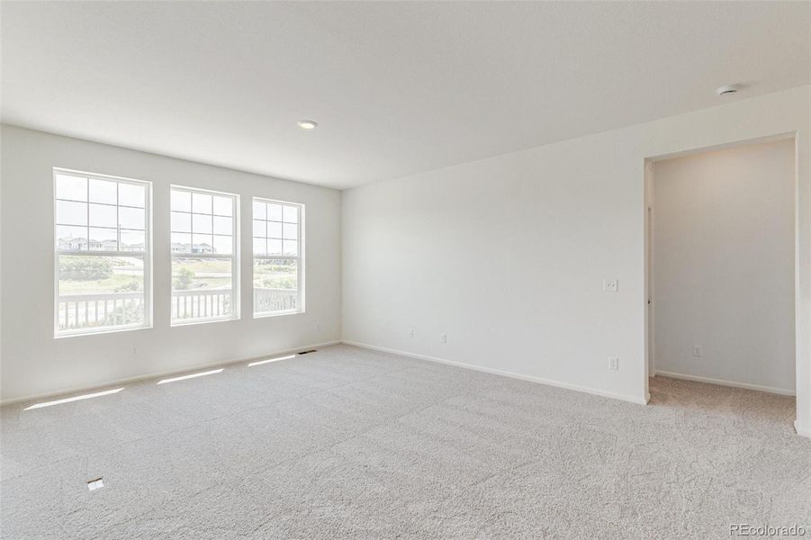 Spacious, unfurnished interior of a new home in Terrain Oak Valley, Castle Rock (Image 20).