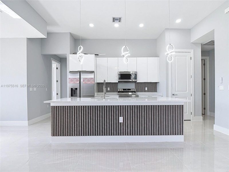 Furnished interior view inside a new home in , Lehigh Acres (Image 12). Furnished interior view inside a new home in , Lehigh Acres (Image 12).