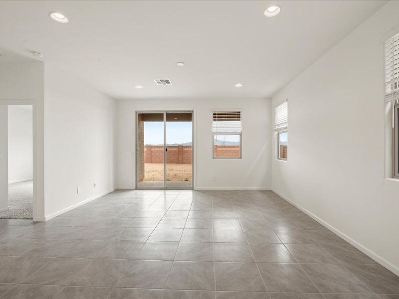 Spacious, unfurnished interior of a new home in Mandarina - Signature Series, Marana (Image 8).