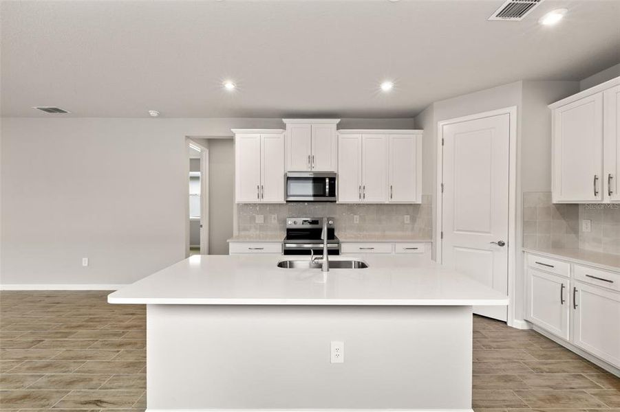 Furnished interior view inside a new home in Sunstone at Wellen Park, Venice (Image 13).