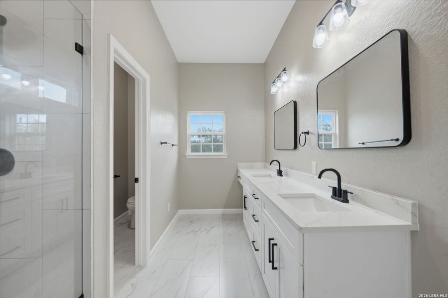 Furnished interior view inside a new home in , Devine (Image 11).
