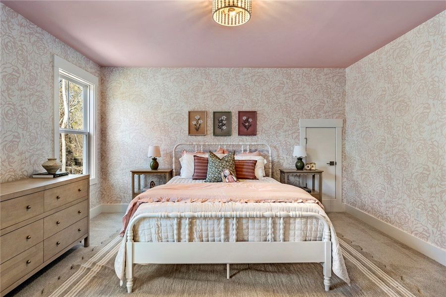 This serene bedroom offers a tranquil retreat with