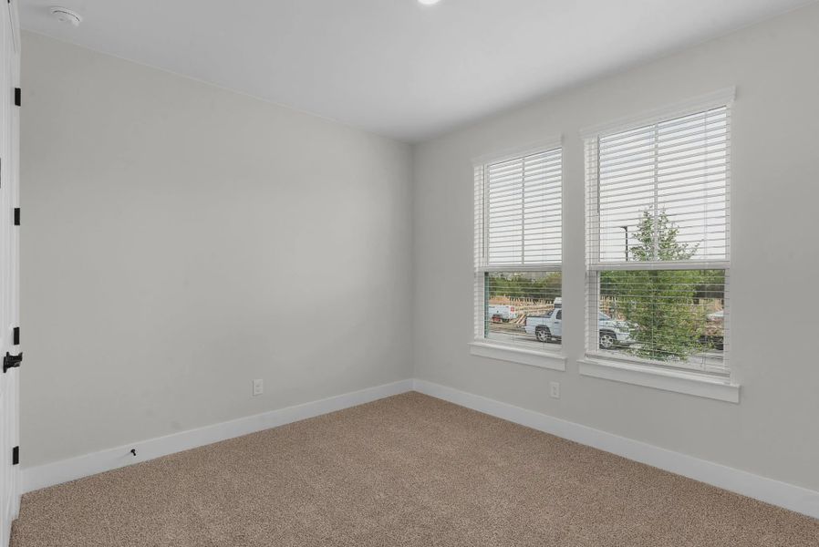 Representative unfurnished interior of a home built from the Brooks by Chesmar Homes in University Heights, McKinney (Image 21).